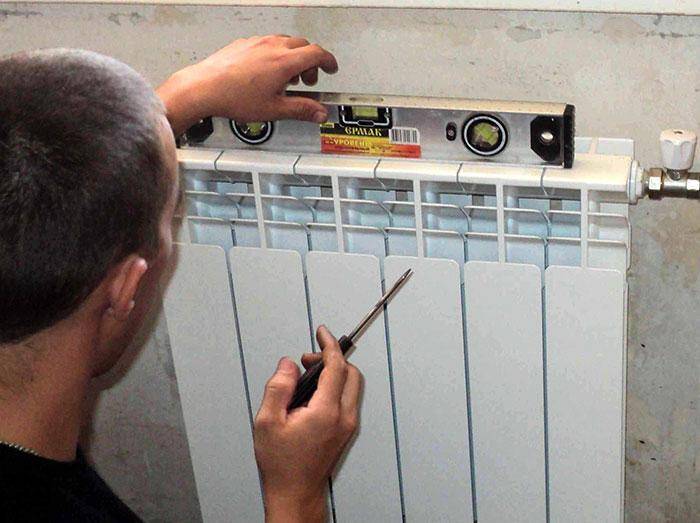 Как правильно повесить радиатор отопления самостоятельно: инструкция и советы