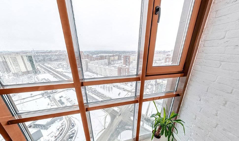 Утепление панорамного балкона: остекление и системы обогрева