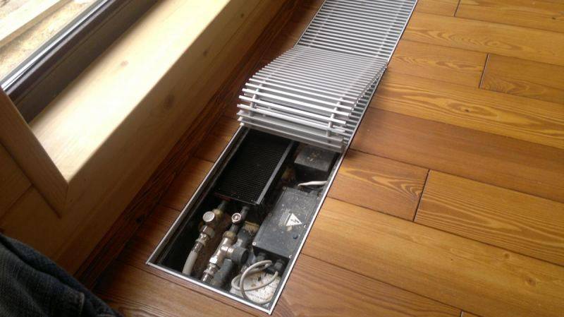Радиаторы отопления в полу: как обогреть помещение со